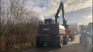 Wheeled excavator Atlas 160W with tipper wagon [upl. by Jessamyn106]