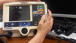 Defibrillator lifepak 20 how to deliver shock [upl. by Fotinas1]