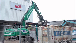 lovely painted Caterpillar M322D excavator demolishing old bus stop [upl. by Nohsad833]