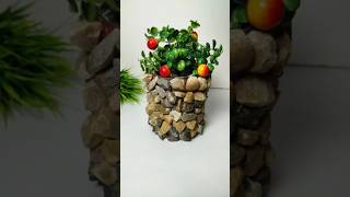 Easy Stone Plant Pot Diy  Stone flower pot Craft  Craft with pebbles viralshortsflowerpotcraft [upl. by Ilaire]