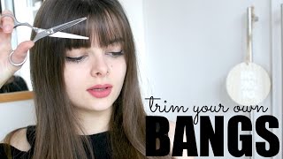 How To Trim Your Own Bangs [upl. by Dalohcin973]