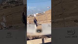 Israeli soldier verbally harasses Palestinian woman carrying white flag [upl. by Norvin]