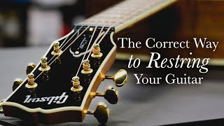 How to Restring An Acoustic Guitar  The Tour Tech Tutorial [upl. by Assenej300]