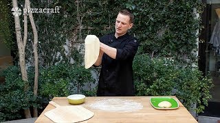 How to Stretch Your Pizza Dough amp How To Use a Pizza Peel [upl. by Etrem]