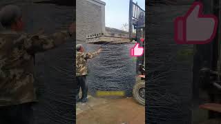 The process of compressing steel wire with the cement board on a forklift [upl. by Milly]