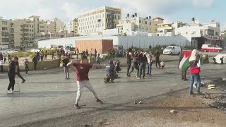 Palestinians throw stones at Israeli forces in West Bank  AFP [upl. by Anaylil]