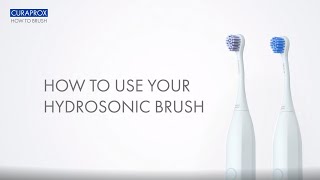 How to Use Your Curaprox Hydrosonic Pro Toothbrush  Instructional Video [upl. by Elurd]