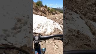 Mountain biking across snow drift at Mammoth Mountain mtb mountainbiking [upl. by Nosille]