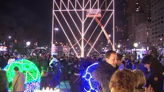 New Yorkers light world’s biggest menorah on first night of Hanukkah [upl. by Oiceladni848]