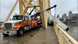 Tow truck crew says years of experience helped them pull dangling semi back onto 2nd Street Bridge [upl. by Jenesia]