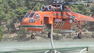 Erickson Sikorsky refills from lake to fight wildfires in Greece [upl. by Akimot795]