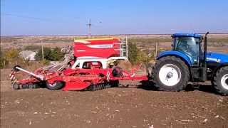 Autumn 2014 barley sowing New Holland T7260 with Poettinger Terrasem C4 Artis [upl. by Hwu20]