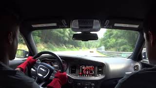 Dodge Charger Hellcat takes on Mercedes AMG GT amp Porsches on Nurburgring [upl. by Sirromed]