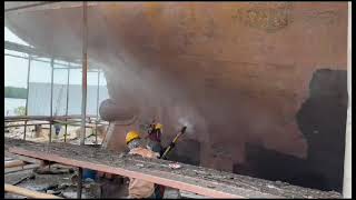 ship hull Hydro blasting  painting and rust removal using DenJet CD1602500 UHP water jetting [upl. by Keffer]