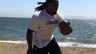 Marshawn Lynch BEASTS Beach Drills While Wearing Boots in the Sand [upl. by Odeen]