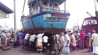 Sri Lankaශ්‍රී ලංකාFishing boat sinkingrecovery in harbor [upl. by Kilar]