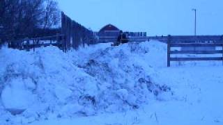 John Deere 440 Crawler pushing lots of snow [upl. by Atinwahs]