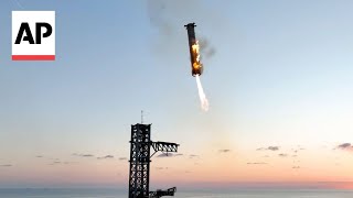 WATCH SpaceX catches Starship rocket booster back at the launch pad [upl. by Ecnahoy980]