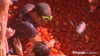 Thousands enjoy annual Tomatina tomato fight festival in Bunol Spain [upl. by Wesley]