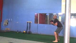 Sandbag squat w horizontal throw [upl. by Albur]