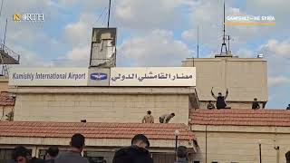 Residents in Qamishli down Syrian regimes flag in Intl Airport [upl. by Irolam]