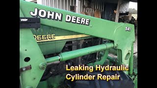 Leaking Hydraulic Cylinder Repair Replacing hydraulic cylinder seals on a John Deere 541 Loader [upl. by Sanoy]