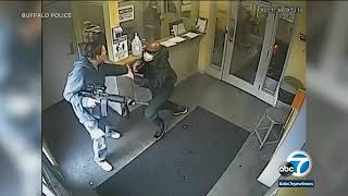 Security guard pounces on armed man at New York medical clinic [upl. by Iturhs]