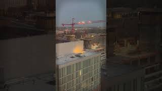 Construction crane overlooking downtown Columbus Ohio with Hilton Hotel in the foreground Unique ￼ [upl. by Jacy504]