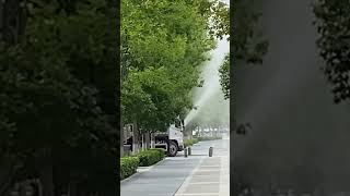 Is this spraying water or spraying pesticide on the tree [upl. by Darrill]