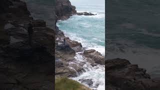 Perranporth Friday morning person fishing battling against Ocean Waves 🌊🌊🌊🌊 [upl. by Reinwald]