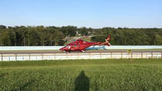 Hendrick Helicopter picking up Chad Knaus and Kenny Francis after the Watkins Glen race [upl. by Sirroned560]