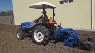 WORKMASTER 40 NEW HOLLAND BARBECHANDO ARADO 2 DISCOS [upl. by Yasmar]