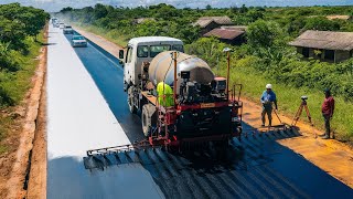 Technology with the bitumen sprayer truck process of applying a layer of bitumen to the road surface [upl. by Clementas]