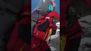 Mount Everest Sherpa carries hiker suffering hypothermia down the mountain on his back [upl. by Hnahc]