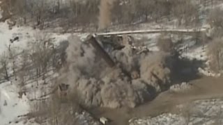 Demolished Implosion destroys historic smokestack in Minnesota [upl. by Nosemyaj]