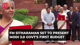 Union Budget 2024 FM Nirmala Sitharaman displays Budget tablet outside Finance Ministry [upl. by Anehsat105]