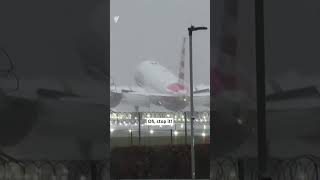 Plane makes bumpy landing at Heathrow Airport in strong winds  SBS News [upl. by Renaldo]