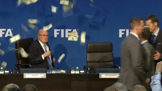 Comedian throws money at Blatter during press conference [upl. by Cann]