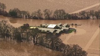 Flood waters wash over California wine country [upl. by Ashby373]