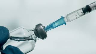 No Copyright Filling an injection with a saline solution  Stock Footage Video [upl. by Kelcie]