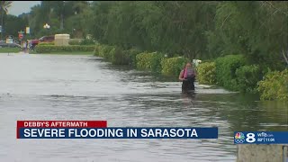 Our freezerits floating Sarasota residents escape flooded home [upl. by Nylesor]