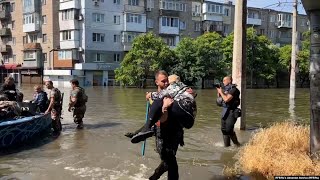 Fleeing Floods Ukrainians Make Perilous Boat Journeys To Safety [upl. by Akamaozu485]