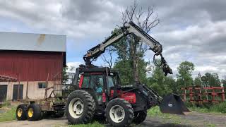 Köp Traktor Valtra Valmet 6650 med kran skogsvagn och hydraulpump med tank [upl. by Richara]