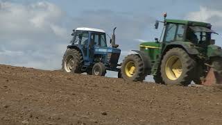 FORD 7910 AND JOHN DEERE 6610 LEVELLING FIELD [upl. by Enautna]