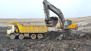 Volvo EC480DL Excavator Loading COAL On Scania Trucks  World Earthmovers [upl. by Elleinod]