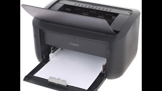 تشغيل الة الطباعة نوع كانون  how to configurate Canon printe first use [upl. by Eldwen]