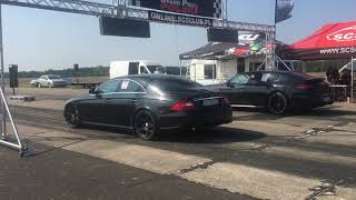 Mercedes CLS 55 AMG 650 HP vs Porsche Panamera GTS [upl. by Yusuk]