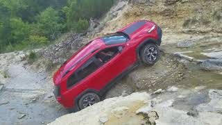 Stock Jeep Cherokee Trailhawk climbs waterfall [upl. by Lauritz]