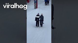 Taking A Ski Lift With No Skis  ViralHog [upl. by Aniroz281]