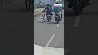 A pillion rider on a motorcycle was seen towing a bicycle on the Kala Nagar flyover in Bandra [upl. by Leyes346]